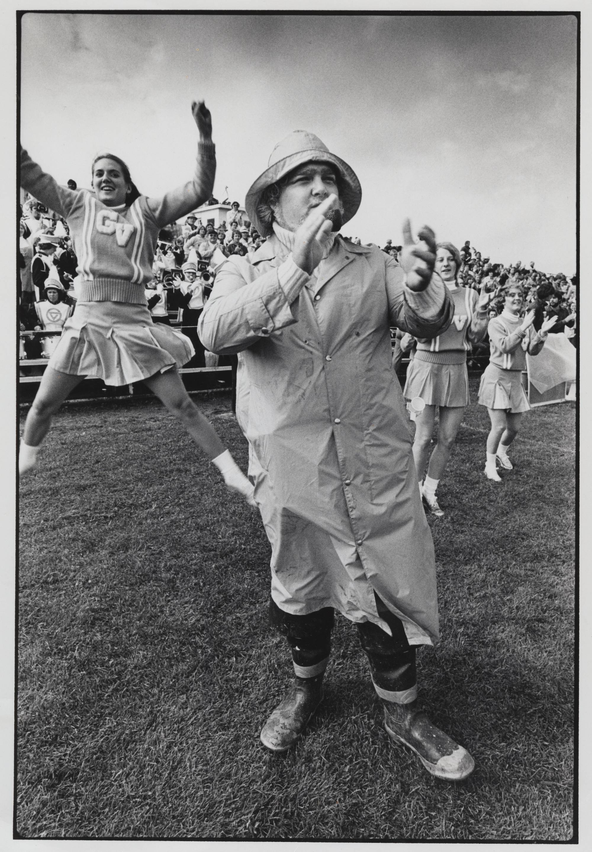 Great Laker clapping with GV cheerleaders jumping